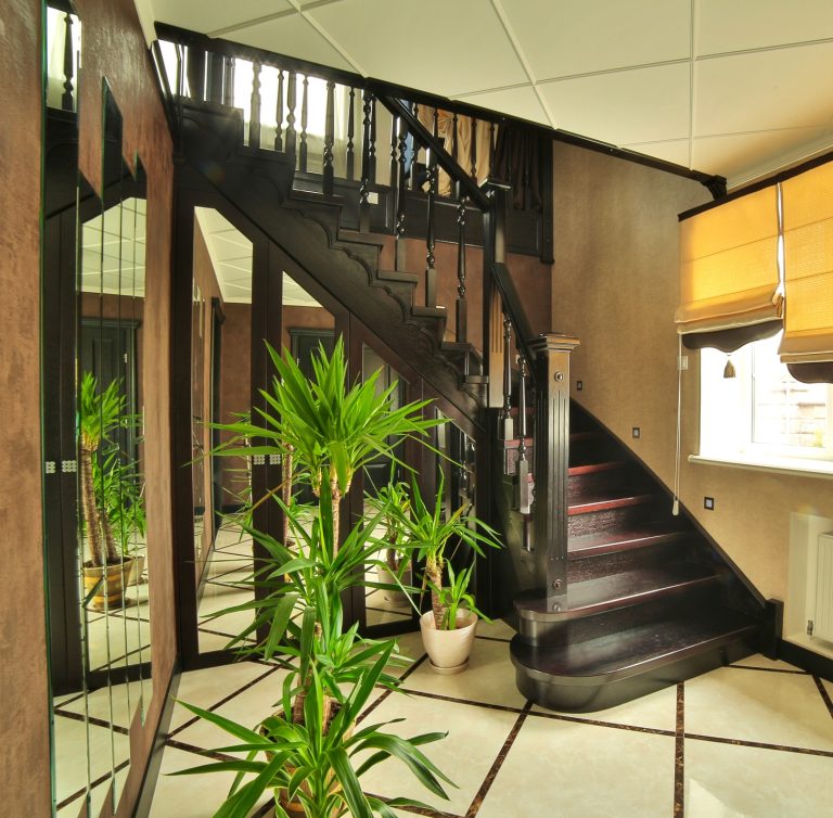 stairs and stair carpet inside a newly modernised house. interior hallway with stairs